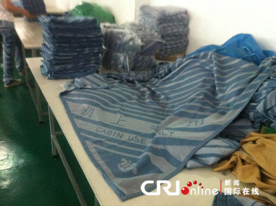 温州航空用品公司"偷工减料"毛毯未清洗直接再用(组图)